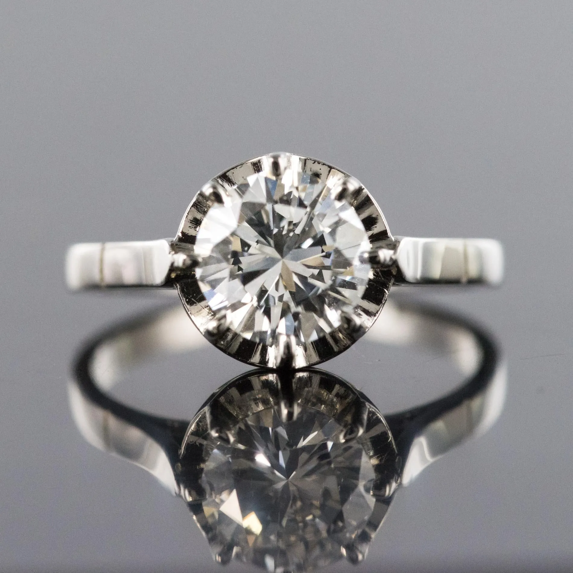 1925s Art Deco 1.50 Carat E.VS Diamond 18 Karat Platinum Solitary Ring