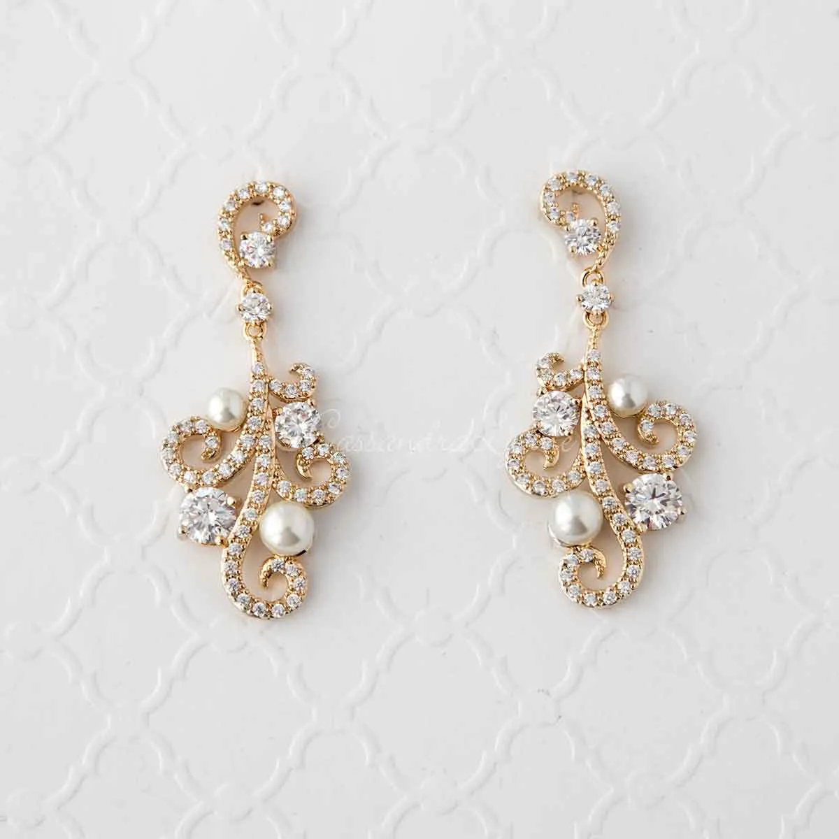 Pearl CZ Earrings with a Swirl Design